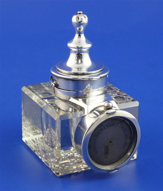 A George V silver mounted combination glass inkwell, pocket watch and barometer holder, height 5in.